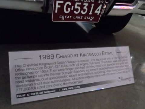 1971 Ford Ranchero - Museum placard details a 1969 Chevrolet Kingswood Estate, engine specs, and base price.
