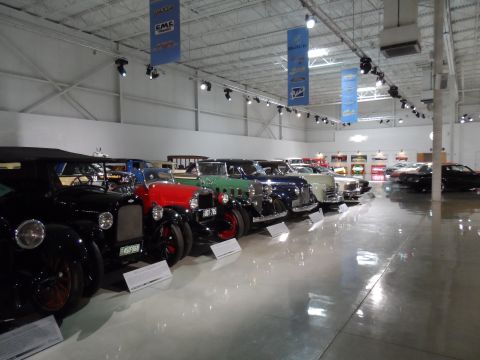 1971 Ford Ranchero - A museum exhibit showcases a collection of classic automobiles from various eras.