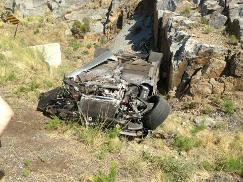2010 Dodge Challenger - Car crashed off the road and is heavily damaged.