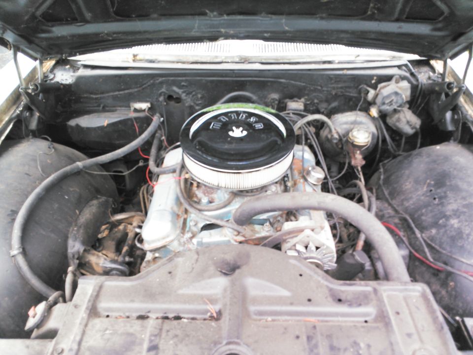 1966 Pontiac Catalina engine bay with V8 engine, air cleaner, and radiator