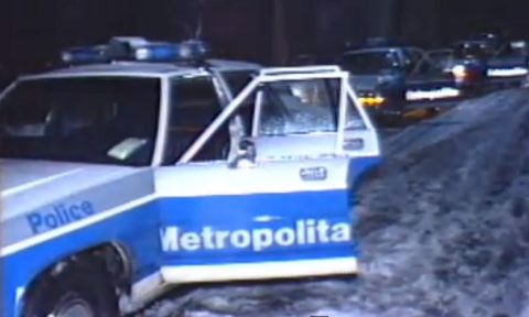 1991 Ford LTD Crown Victoria - A police car with "Metropolita" and "Police" text is seen at night, with other vehicles in the background.