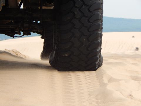 1978 Ford Bronco - Tire on sand dune.