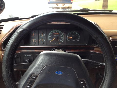 1989 Ford Bronco - The interior of a 1989 Ford Bronco, showing the dashboard and steering wheel with its instrument cluster.
