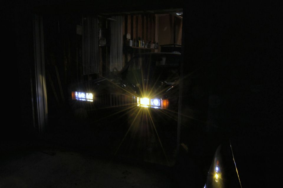1985 Mercury Grand Marquis front view with headlights on