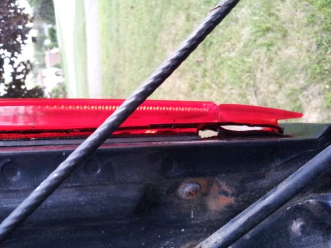1995 Ford Bronco - Detail of a red LED taillight assembly, showing its construction and mounting area.