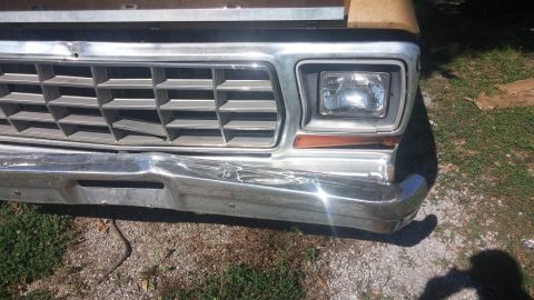 1979 Ford Bronco - Close-up of the front grille and bumper on a 1979 Ford Bronco.