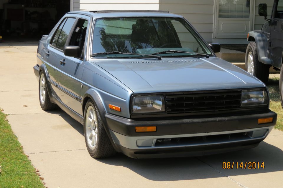 Blue sedan, 3q front view. 1985 Volkswagen Jetta