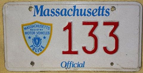 1991 Ford LTD Crown Victoria - Photograph of a Massachusetts Official license plate numbered 133, not a technical document.