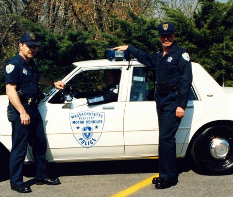 1991 Ford LTD Crown Victoria - Massachusetts Registry of Motor Vehicles police officers with their 1991 Ford Crown Victoria LTD patrol car.