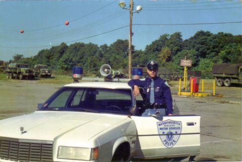 1991 Ford LTD Crown Victoria - Massachusetts Registry of Motor Vehicles Police officer with a 1991 Ford Crown Victoria LTD patrol car.