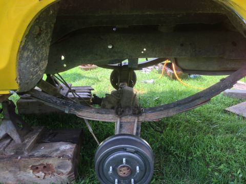 1979 Ford Bronco - Underside view of a 1979 Ford Bronco's rear axle assembly and leaf springs.
