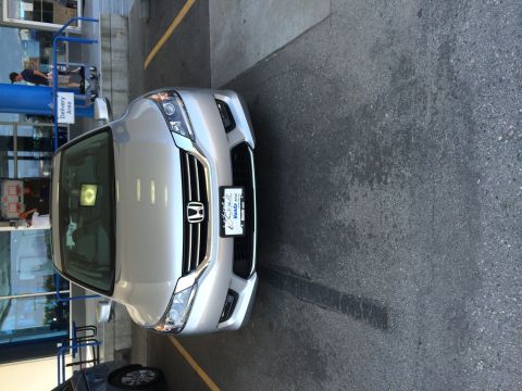 2014 Honda Accord - Front view of a silver 2014 Honda Accord parked in front of a building.