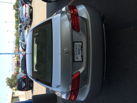 2014 Honda Accord - This Honda Accord sedan is parked in a lot with other vehicles. The license plate frame indicates it's from Honda Boise.