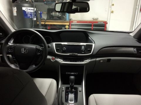 2014 Honda Accord - The interior of a car is shown, with a focus on the dashboard and controls. A watermark for Supermotors.net is visible.