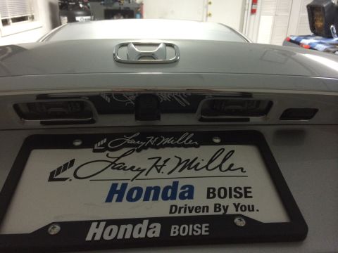 2014 Honda Accord - The rear of a silver Honda Accord is shown, a license plate frame from a dealership.