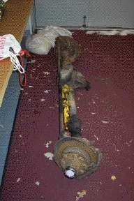 1996 Ford Bronco - A front axle assembly with brake components is shown, with a "SUPERMOTORS" logo at the bottom.
