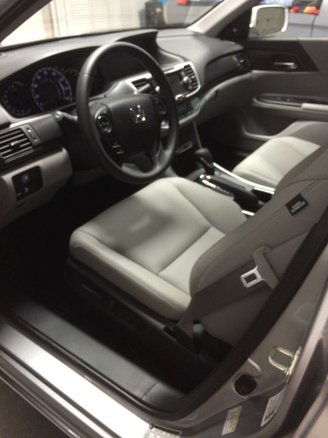 2014 Honda Accord - Interior view of a 2014 Honda Accord, highlighting the dashboard and seating.