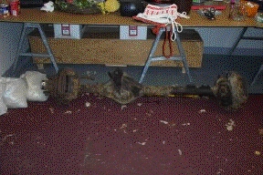 1996 Ford Bronco - A rear axle assembly is shown, likely a vehicle part, with visible rust and wear.