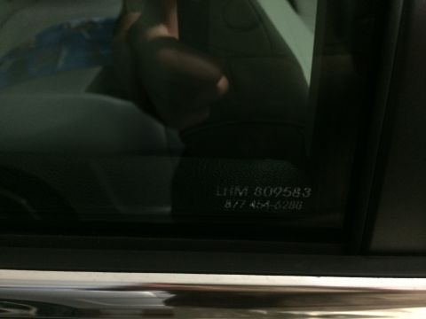 2014 Honda Accord - Etched text on car door glass shows a VIN and a phone number.