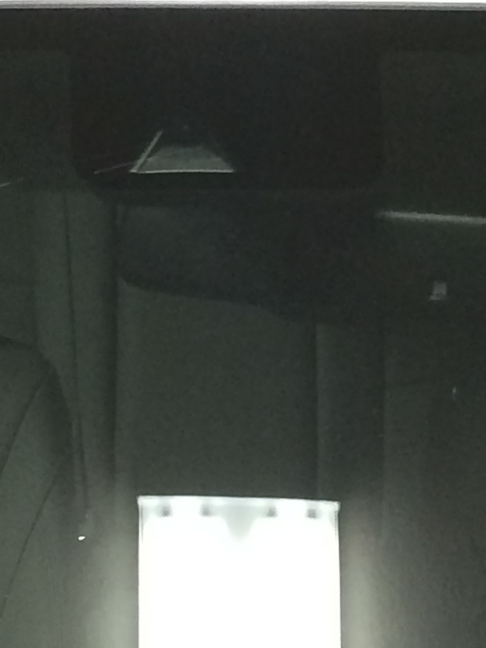 Interior overhead light fixture with SuperMotors logo visible below