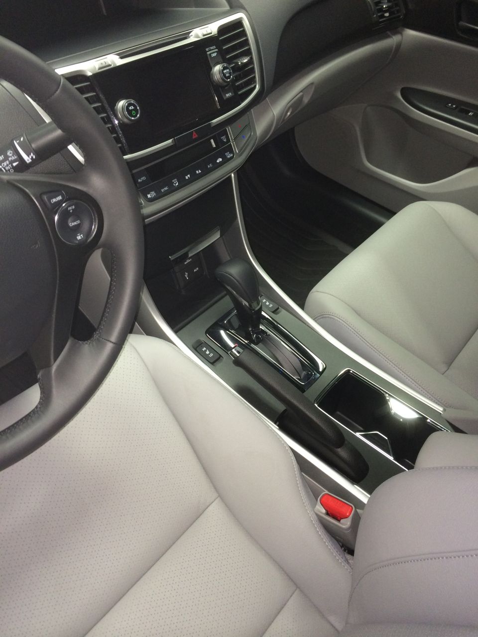 2014 Honda Accord interior showing dashboard, steering wheel, and center console