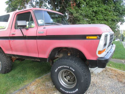 1979 Ford Bronco - This 1979 Ford Bronco is shown from the front three-quarter view, lifted with off-road tires.