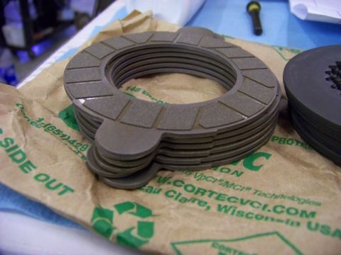 1999 Mercury Grand Marquis - Clutch friction plates are shown on their packaging, ready for installation.