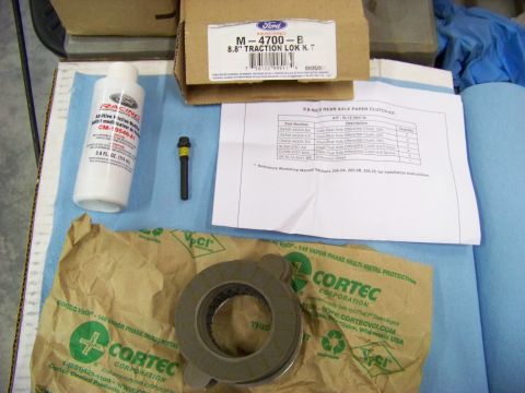 1999 Mercury Grand Marquis - Ford M-4700-B 8.8" Traction Lok Kit and Cortec differential clutch kit are laid out for installation.