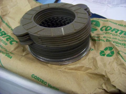 1999 Mercury Grand Marquis - Clutch plates are shown on protective paper from Cortec Corporation.