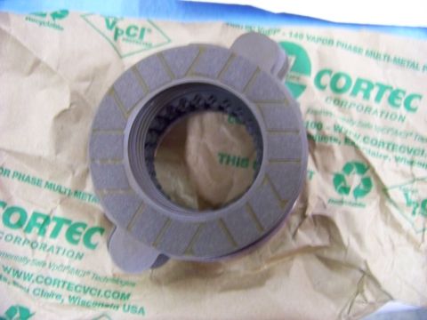 1999 Mercury Grand Marquis - A clutch disc is shown on protective Cortec VCI paper, likely for a transmission rebuild.
