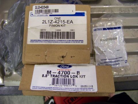 1999 Mercury Grand Marquis - Ford Racing differential and traction lok kits are shown, with part numbers and dates visible on the packaging.