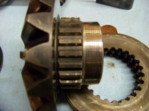 1999 Mercury Grand Marquis - Close-up view of internal gears and a toothed ring, likely from a vehicle's differential.