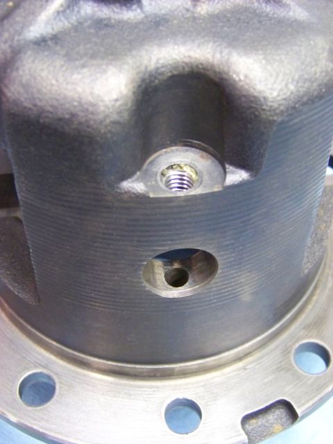 1999 Mercury Grand Marquis - Differential housing part with a threaded bolt hole and an opening.