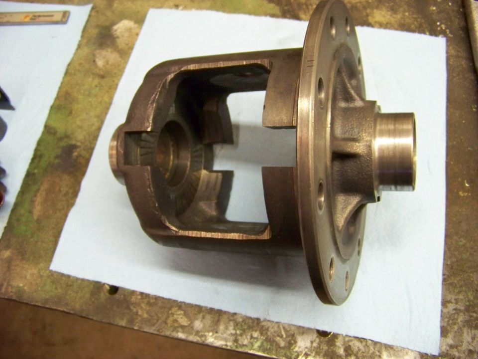 Differential housing part on a white paper towel, with a ruler and other tools in the background