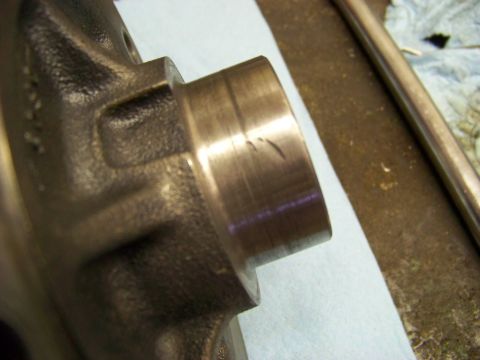 1999 Mercury Grand Marquis - Close-up of a metal component showing visible scratches and wear marks.