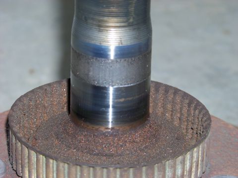 1999 Mercury Grand Marquis - This image shows a close-up view of a rusted axle spline and hub assembly, likely a vehicle part.