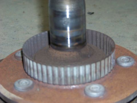 1999 Mercury Grand Marquis - A rusty drivetrain component is shown in a close-up view.