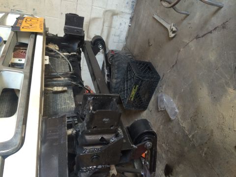 1994 Ford Bronco - Front view of a 1994 Ford Bronco showing modifications to the suspension and radiator area.