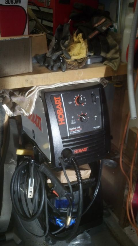 1995 Ford Bronco - A Hobart Handler 190 welder is shown with its associated cables and welding torch.