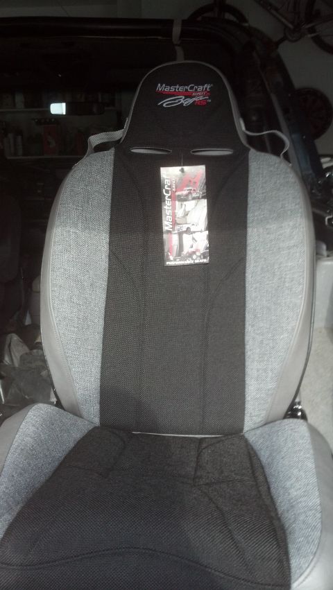 1995 Ford Bronco - A fabric car seat with a "MasterCraft" logo is shown.
