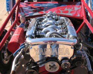1993 Ford Taurus - A custom dune buggy features a highly polished Yamaha engine with flame graphics.