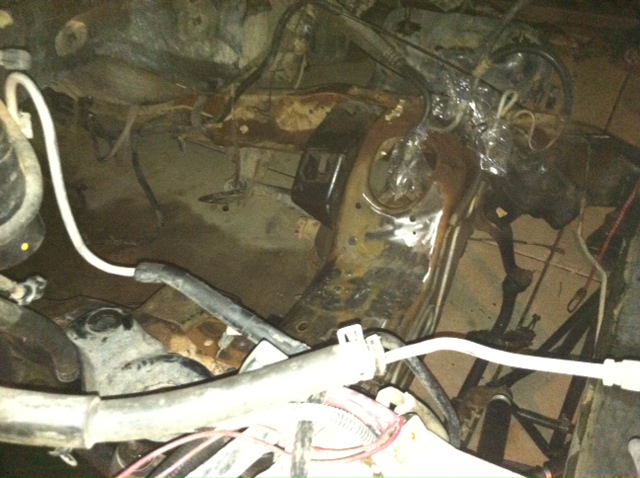 Engine bay with hoses and wiring