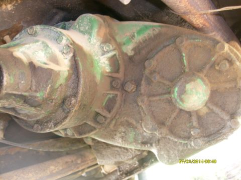 1979 GMC C/K Pickup - This photo shows a close-up view of a heavily soiled transfer case, likely from a truck or off-road vehicle.