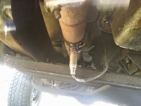 1996 Ford Bronco - An oxygen sensor is mounted on the exhaust system of a vehicle.