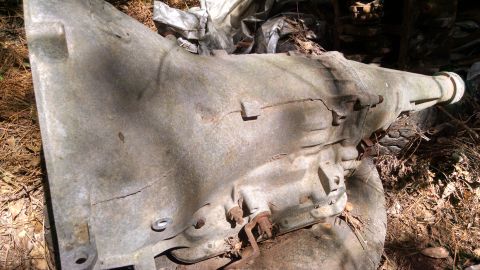 1978 Ford Bronco - This is an old automatic transmission, showing significant wear and damage.