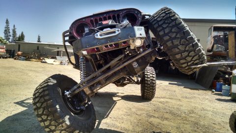 1985 Jeep CJ7 - This heavily modified Jeep features oversized tires and a winch, its extreme off-road capabilities.