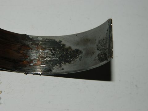 1979 Ford Bronco - This engine bearing shows significant wear and damage from oil starvation or contamination.