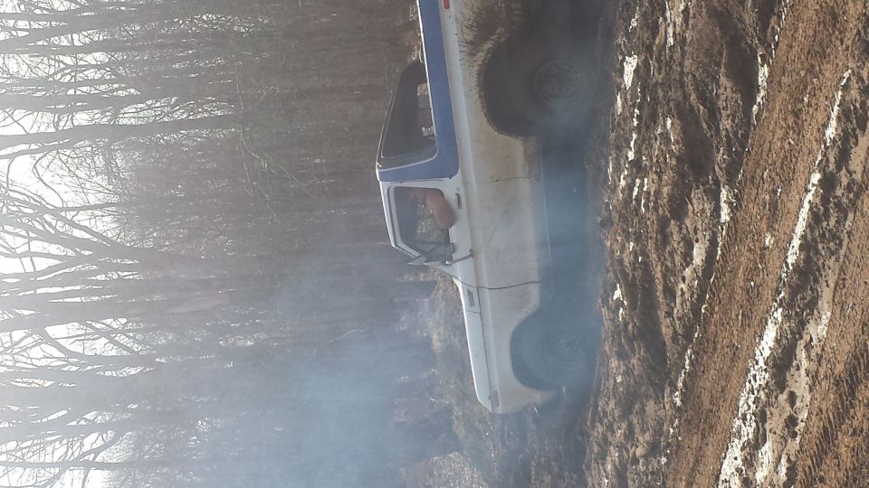 1979 Ford Bronco driving through mud and trees