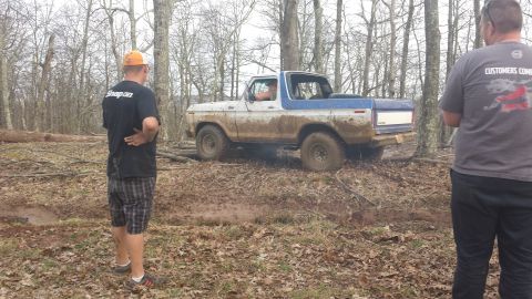 1979 Ford Bronco - Ford Bronco stuck in mud off-road.