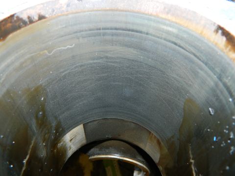 1979 Ford Bronco - Close-up view of a cylinder wall showing signs of wear and oil contamination.